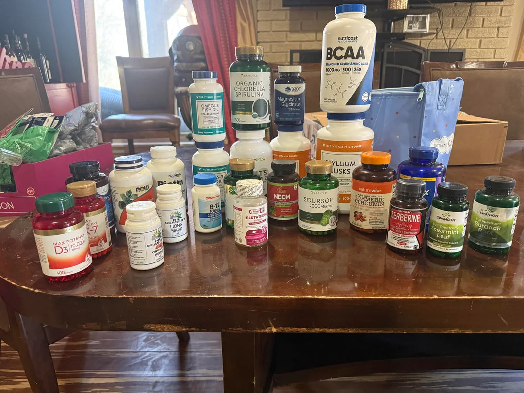 A shelf of half-empty supplement bottles